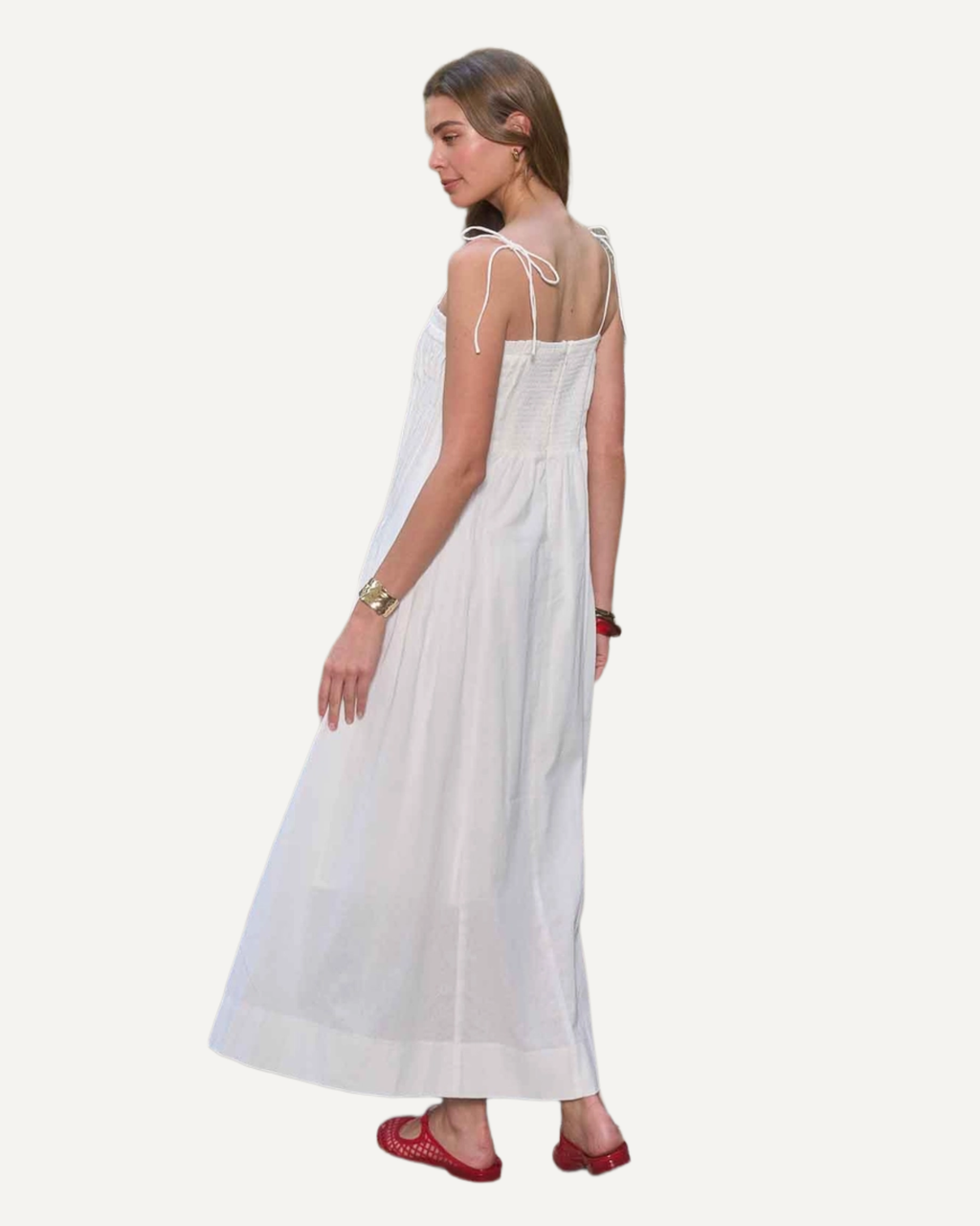 model wearing white maxi dress